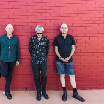 The Necks on the red wall